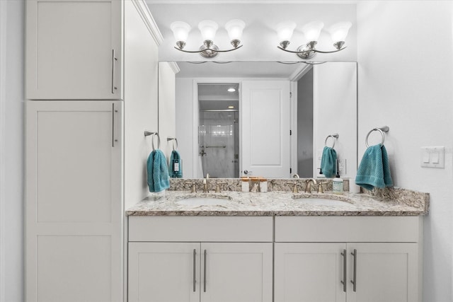 full bathroom featuring a sink, double vanity, and an enclosed shower