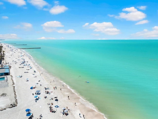 aerial view featuring a water view and a view of the beach
