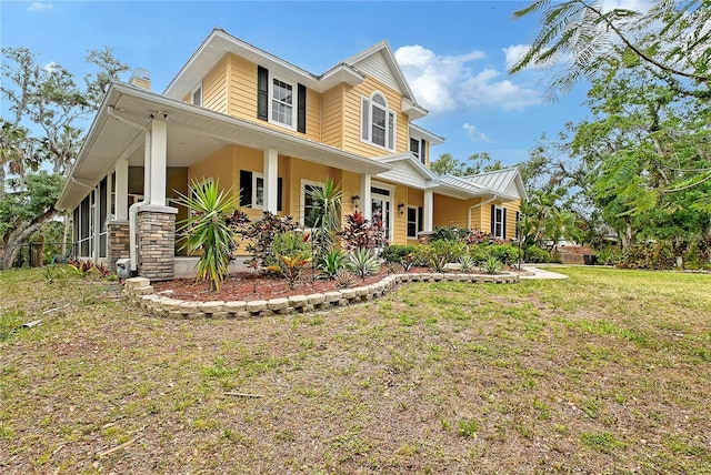 1788 Palm View Rd, Sarasota, FL 34240 - view of front of house with a chimney and a front lawn