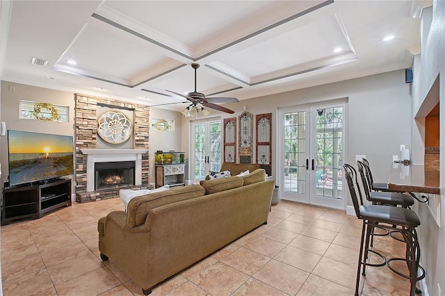 1788 Palm View Rd, Sarasota, FL 34240 - living area with a ceiling fan, french doors, visible vents, a fireplace, and light tile patterned floors