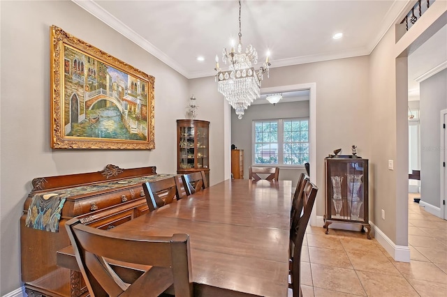 1788 Palm View Rd, Sarasota, FL 34240 - dining area with light tile patterned floors, ornamental molding, recessed lighting, and a chandelier