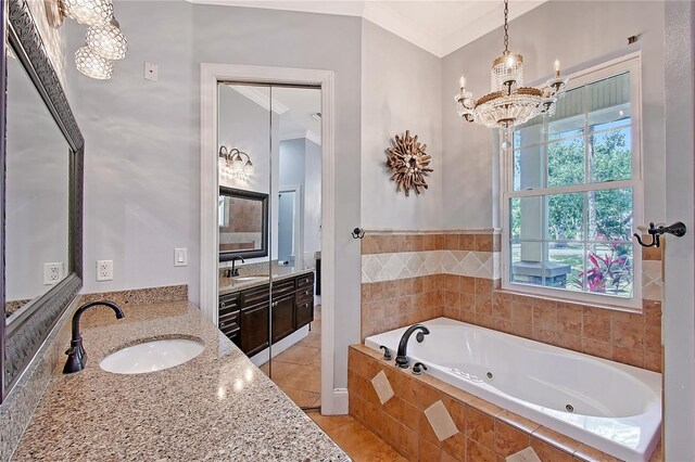 1788 Palm View Rd, Sarasota, FL 34240 - full bath featuring tile patterned floors, a chandelier, a tub with jets, and a sink
