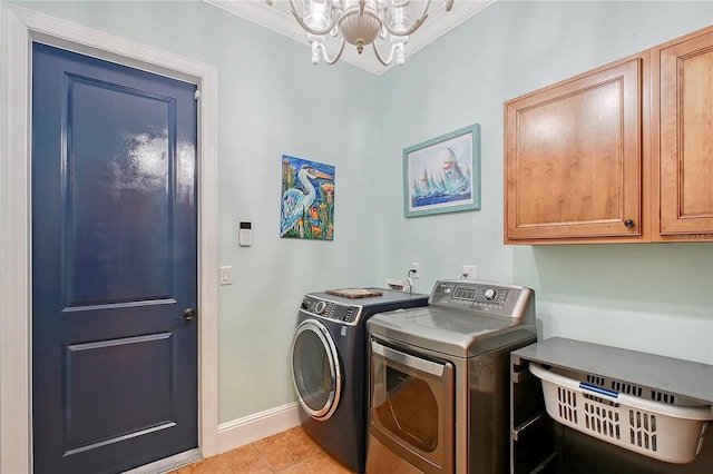 1788 Palm View Rd, Sarasota, FL 34240 - laundry room with cabinet space, baseboards, an inviting chandelier, separate washer and dryer, and light tile patterned flooring