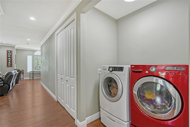 1788 Palm View Rd, Sarasota, FL 34240 - laundry area featuring washer and dryer, recessed lighting, baseboards, wood finished floors, and ornamental molding