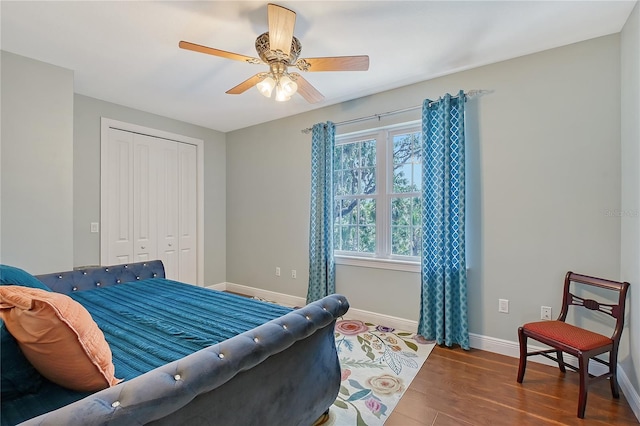 1788 Palm View Rd, Sarasota, FL 34240 - bedroom featuring a closet, a ceiling fan, baseboards, and wood finished floors