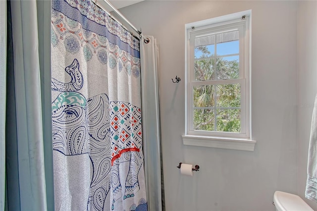 1788 Palm View Rd, Sarasota, FL 34240 - bathroom with curtained shower and toilet