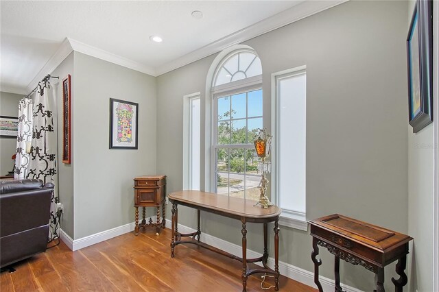 1788 Palm View Rd, Sarasota, FL 34240 - interior space featuring baseboards, ornamental molding, recessed lighting, and wood finished floors