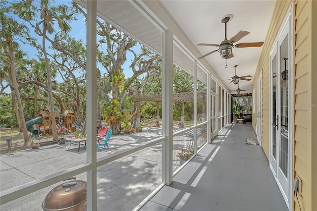 1788 Palm View Rd, Sarasota, FL 34240 - unfurnished sunroom featuring ceiling fan and french doors