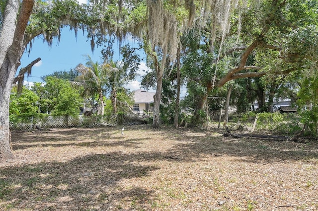 view of yard featuring fence