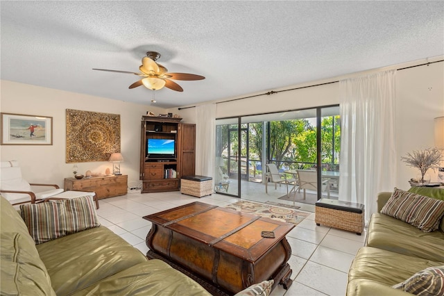 6780 Schooner Bay Cir Unit 6780, Sarasota, FL 34231 - living area with light tile patterned flooring, a textured ceiling, and ceiling fan