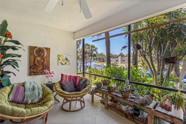 6780 Schooner Bay Cir Unit 6780, Sarasota, FL 34231 - sunroom / solarium featuring a textured wall and a water view