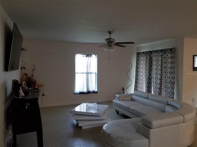 living room featuring tile patterned flooring and ceiling fan