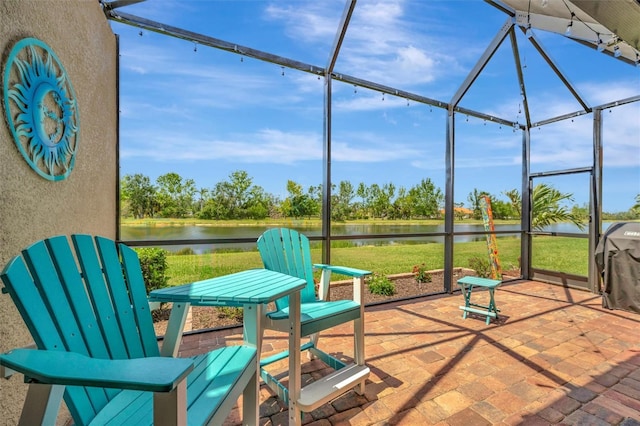sunroom with a water view