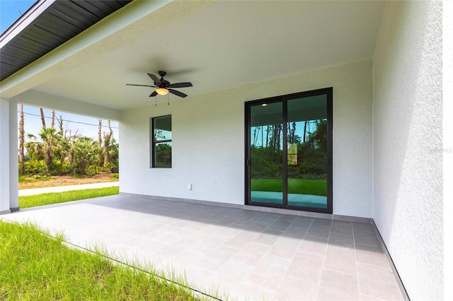 view of patio / terrace featuring a ceiling fan