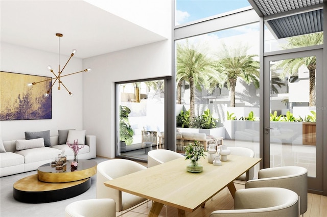 2170 Robinhood St # A1-302, Sarasota, FL 34231 - living room featuring a chandelier and a high ceiling