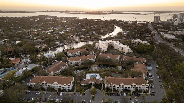 aerial view of property's location with a large body of water