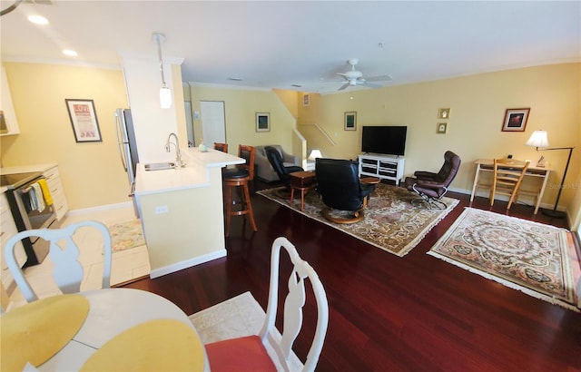 850 S Tamiami Trl Unit 529, Sarasota, FL 34236 - dining area with wood finished floors, a ceiling fan, crown molding, baseboards, and recessed lighting