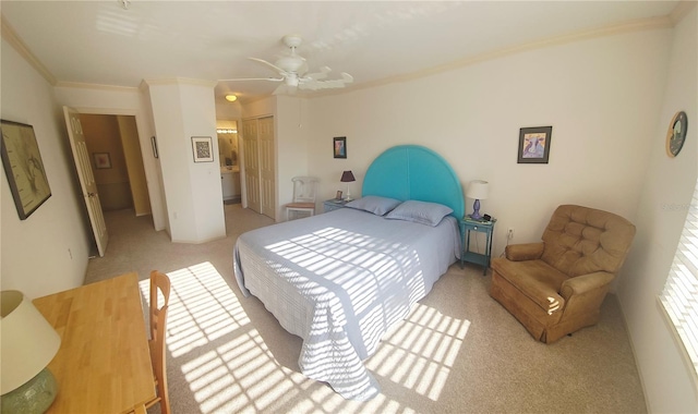 850 S Tamiami Trl Unit 529, Sarasota, FL 34236 - carpeted bedroom featuring crown molding, a closet, and a ceiling fan