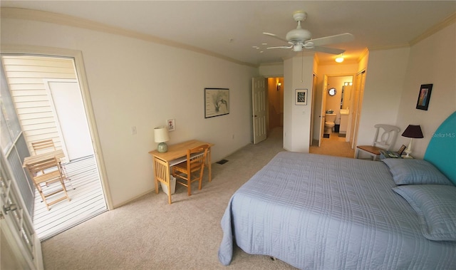 850 S Tamiami Trl Unit 529, Sarasota, FL 34236 - bedroom with light colored carpet, crown molding, ensuite bath, and a ceiling fan