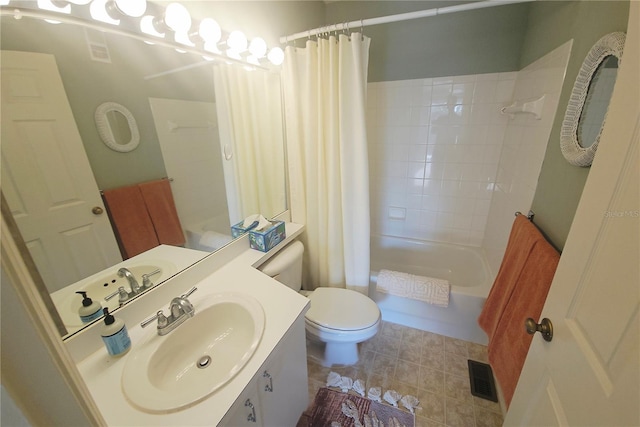850 S Tamiami Trl Unit 529, Sarasota, FL 34236 - full bathroom with toilet, shower / tub combo, vanity, and tile patterned floors