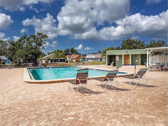 3909 40th St W, Bradenton, FL 34205 - community pool featuring a patio area and fence