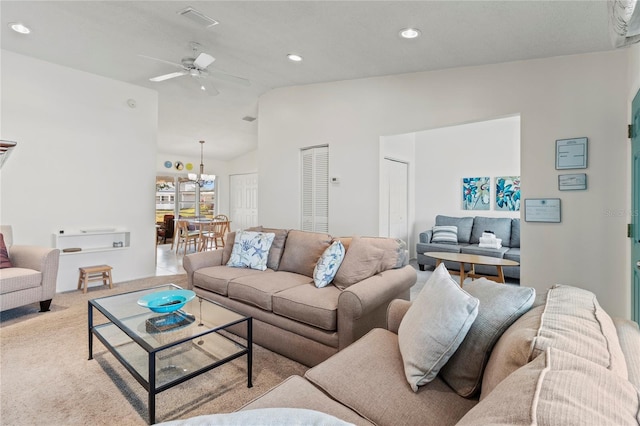3909 40th St W, Bradenton, FL 34205 - living room with ceiling fan, visible vents, carpet floors, lofted ceiling, and recessed lighting