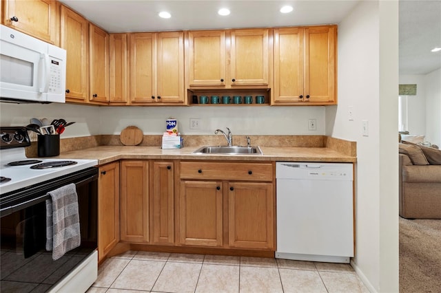 3909 40th St W, Bradenton, FL 34205 - kitchen featuring a sink, light countertops, recessed lighting, and white appliances