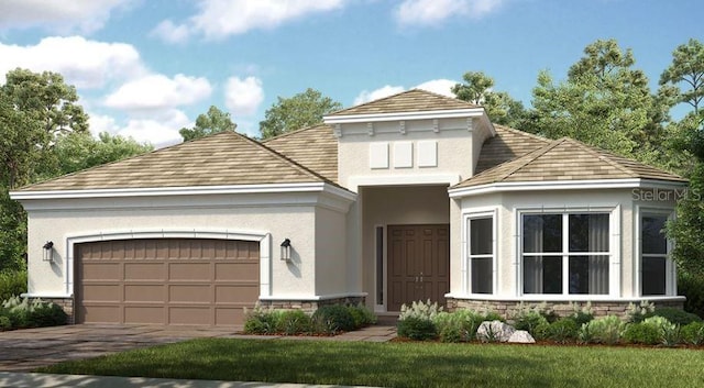 view of front of house featuring an attached garage, stone siding, concrete driveway, and stucco siding