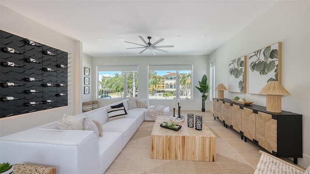8800 Midnight Pass Rd, Sarasota, FL 34242 - living room with light wood-style floors and a ceiling fan