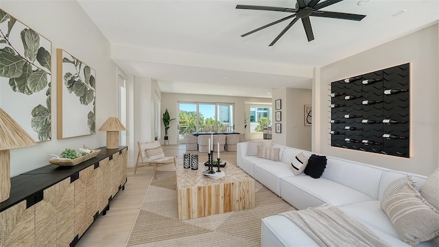 8800 Midnight Pass Rd, Sarasota, FL 34242 - living room with ceiling fan and light wood-style floors