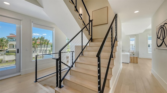 8800 Midnight Pass Rd, Sarasota, FL 34242 - stairs with wood finished floors and recessed lighting