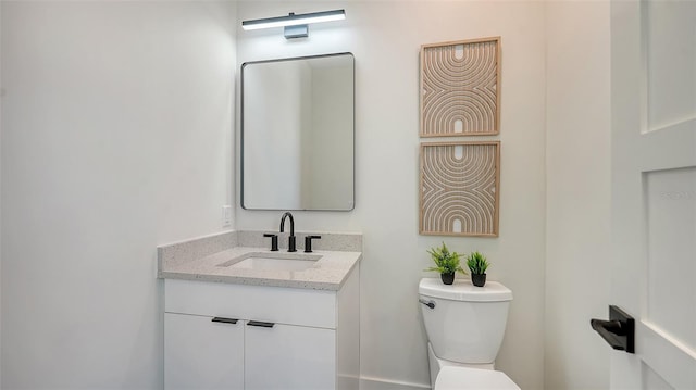 8800 Midnight Pass Rd, Sarasota, FL 34242 - bathroom featuring toilet and vanity