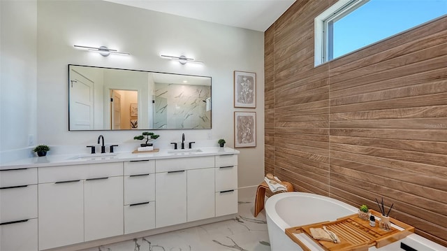 8800 Midnight Pass Rd, Sarasota, FL 34242 - full bathroom featuring wooden walls, a marble finish shower, double vanity, marble finish floors, and a freestanding tub