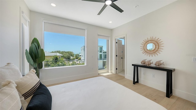 8800 Midnight Pass Rd, Sarasota, FL 34242 - bedroom with multiple windows, access to exterior, wood finished floors, recessed lighting, and ceiling fan