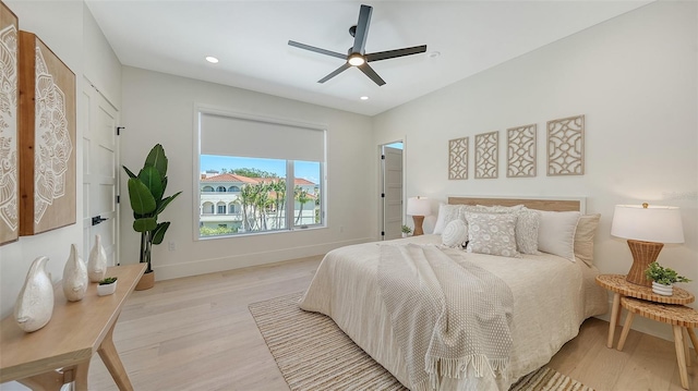 8800 Midnight Pass Rd, Sarasota, FL 34242 - bedroom with light wood-type flooring, recessed lighting, and ceiling fan