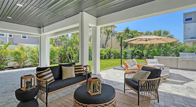 8800 Midnight Pass Rd, Sarasota, FL 34242 - view of patio with an outdoor living space and exterior kitchen