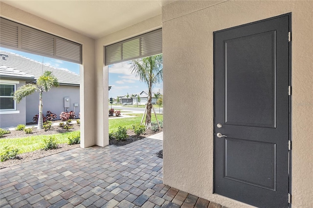 exterior space featuring stucco siding