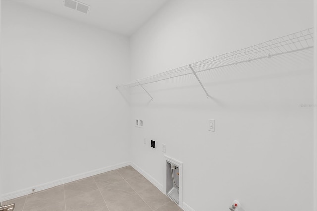 laundry room featuring laundry area, hookup for a gas dryer, baseboards, visible vents, and washer hookup