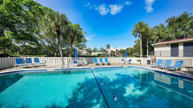 community pool with fence