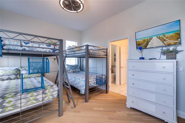 bedroom with wood finished floors