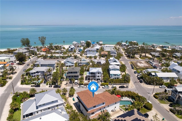birds eye view of property featuring a water view and a residential view