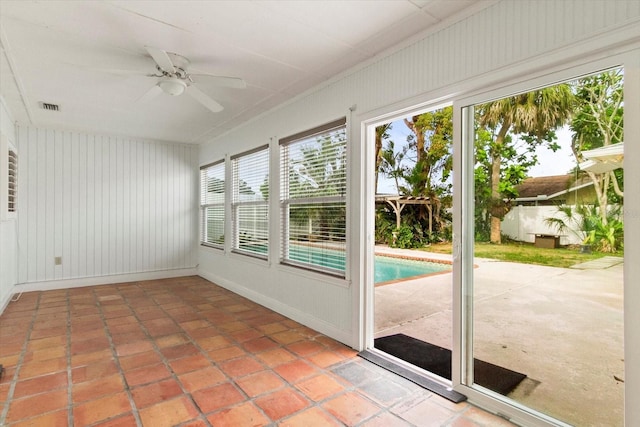 2961 Valencia Rd, Venice, FL 34293 - unfurnished sunroom featuring visible vents