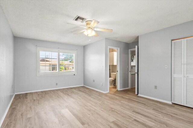 2961 Valencia Rd, Venice, FL 34293 - unfurnished bedroom with baseboards, light wood-style flooring, and visible vents
