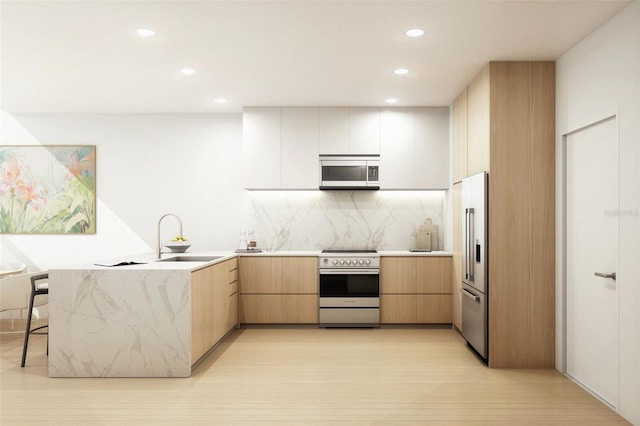 2170 Robinhood St Unit C1-409, Sarasota, FL 34231 - kitchen with appliances with stainless steel finishes, a sink, modern cabinets, recessed lighting, and backsplash