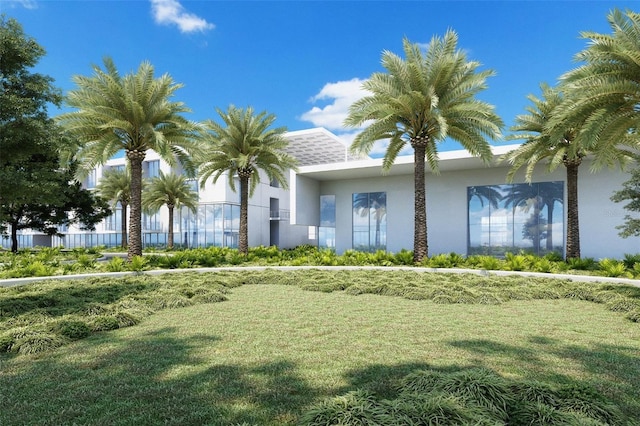 2170 Robinhood St Unit A2-305, Sarasota, FL 34231 - view of front of home featuring stucco siding and a front yard