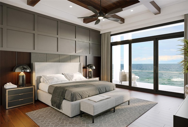 4050 Higel Ave, Sarasota, FL 34242 - bedroom with beam ceiling, dark wood-style floors, coffered ceiling, a water view, and access to outside