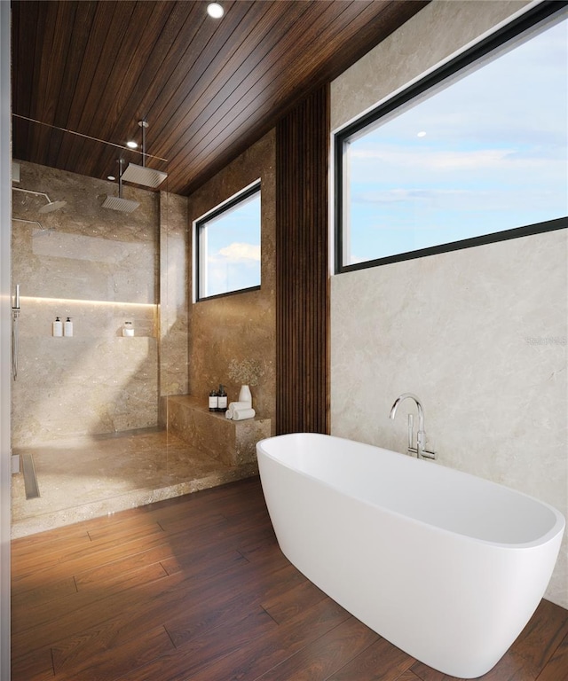 4050 Higel Ave, Sarasota, FL 34242 - full bathroom featuring wood finished floors, a freestanding tub, and a walk in shower