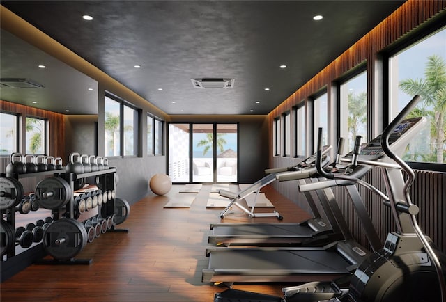 4050 Higel Ave, Sarasota, FL 34242 - gym with wood-type flooring, a healthy amount of sunlight, and recessed lighting