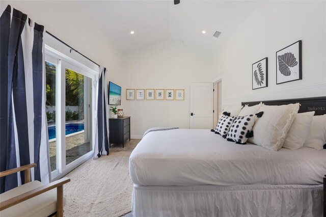 305 73rd St, Holmes Beach, FL 34217 - bedroom with lofted ceiling, visible vents, and access to exterior