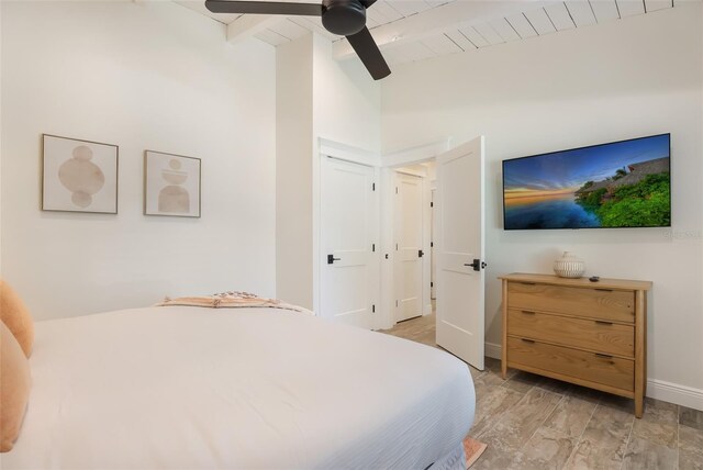 305 73rd St, Holmes Beach, FL 34217 - bedroom featuring vaulted ceiling with beams, wooden ceiling, baseboards, and ceiling fan
